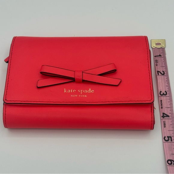 Kate Spade NY Sawyer Street Callie Tri-Fold Wallet with Bow Detail in Geranium - Picture 9 of 11